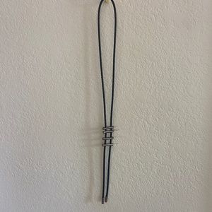 Leather and metal bolo necklace